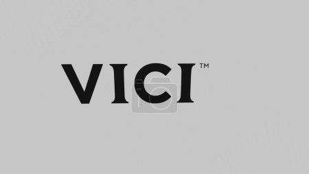 Foto de 07 de septiembre de 2023 Nueva York, Nueva York. El logotipo de Vici Properties en una pared blanca de pantallas. Marca Vici Properties en un dispositivo. - Imagen libre de derechos
