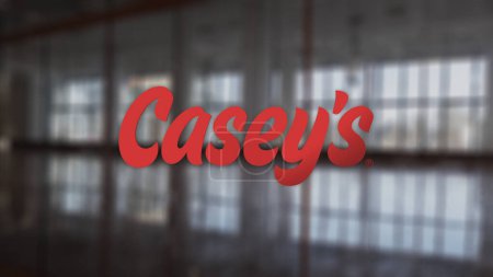 Photo for November 20th 2023. The logo of Casey's General Stores on a hall's window in a business district.. - Royalty Free Image