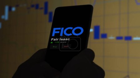 Foto de 15 de enero de 2024. El logotipo de Fair Isaac en la pantalla de un intercambio. Stock justo de precios de Isaac, $FICO en un dispositivo. - Imagen libre de derechos