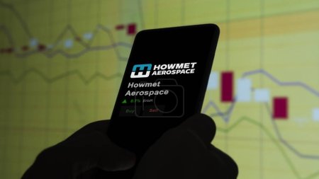 15. Januar 2024. Das Logo von Howmet Aerospace auf dem Bildschirm einer Börse. Howmet Aerospace Preis Aktien, $HWM auf einem Gerät.