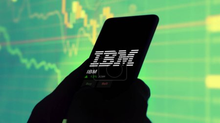 Logo of IBM on the screen of an exchange. IBM price stocks, $IBM on a device.