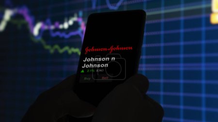Foto de 15 de enero de 2024. El logotipo de Johnson n Johnson en la pantalla de un intercambio. Johnson & Johnson acciones de precios, $JNJ en un dispositivo. - Imagen libre de derechos