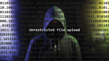 Cyber attack unrestricted file upload text in foreground screen, anonymous hacker hidden with hoodie in the blurred background. Vulnerability text in binary system code on editor program.