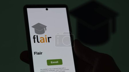 Photo for March 04th 2024. Student enrolls to flair program on a phone, upskilling certification by e-learning - Royalty Free Image