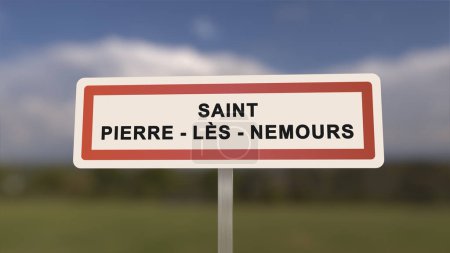 City sign of Saint-Pierre-les-Nemours. Entrance of the town of Saint Pierre les Nemours in, Seine-et-Marne, France