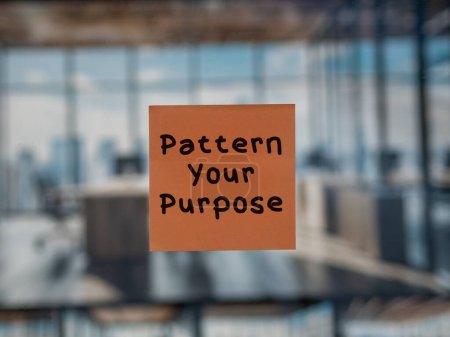 Post note on glass with 'Pattern Your Purpose'.