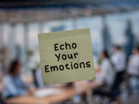 Post note on glass with 'Echo Your Emotions'.