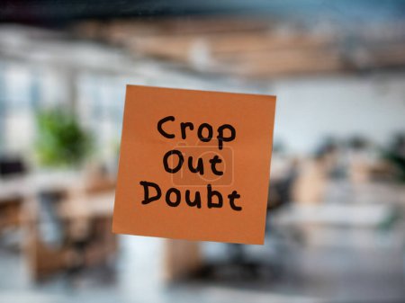 Post note on glass with 'Crop Out Doubt'.