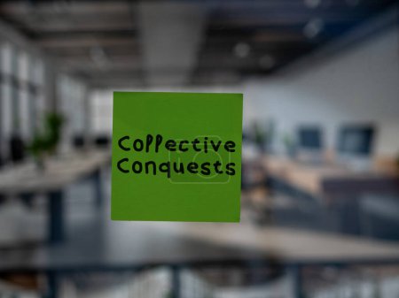 Post note on glass with 'Collective Conquests'.