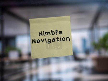 Post note on glass with 'Nimble Navigation'.