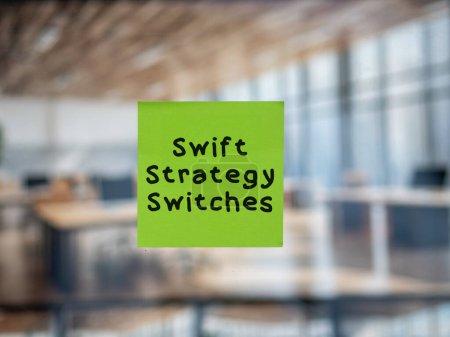 Post note on glass with 'Swift Strategy Switches'.