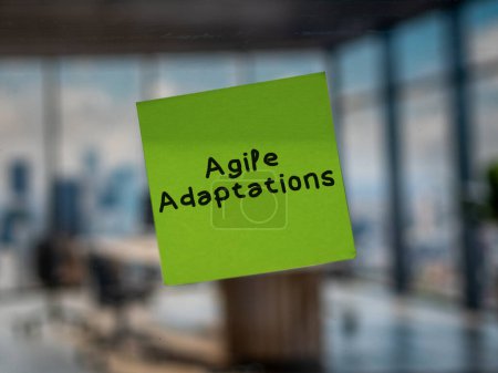Post note on glass with 'Agile Adaptations'.
