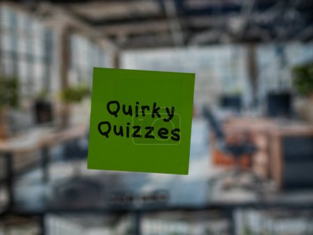 Post note on glass with 'Quirky Quizzes'.