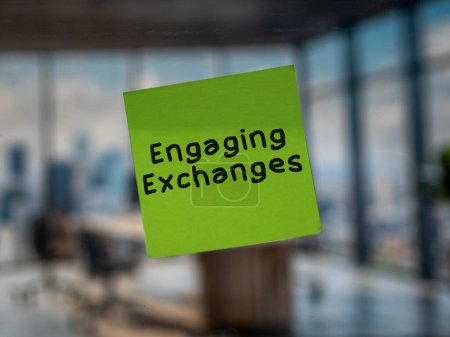 Post note on glass with 'Engaging Exchanges'.