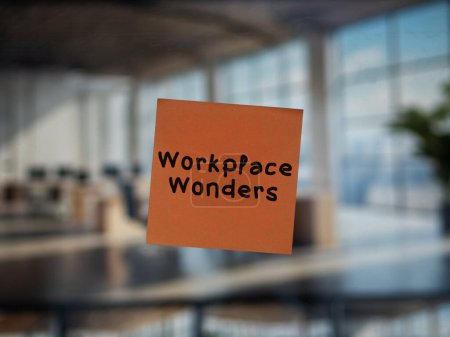 Post note on glass with 'Workplace Wonders'.