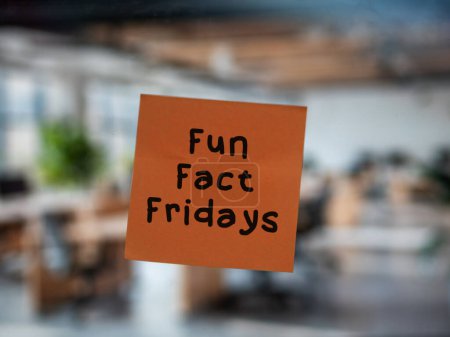 Post note on glass with 'Fun Fact Fridays'.