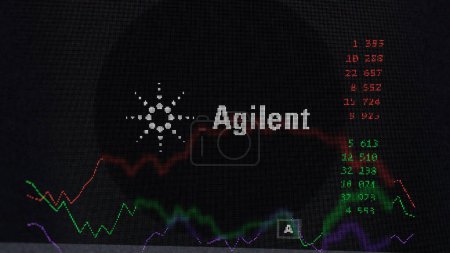Photo for March 19th 2024. The logo of Agilent Technologies on the screen of an exchange. Agilent Technologies price stocks, $A on a device. - Royalty Free Image