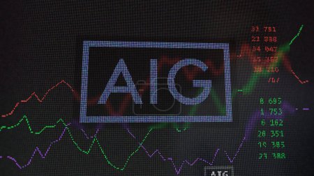 Photo for March 19th 2024. The logo of American International Group on the screen of an exchange. American International Group price stocks, $AIG on a device. - Royalty Free Image