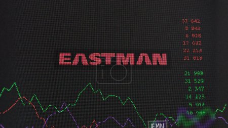 Photo for March 19th 2024. The logo of Eastman Chemical Company on the screen of an exchange. Eastman Chemical Company price stocks, $EMN on a device. - Royalty Free Image