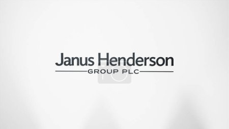 Téléchargez les photos : 26 mars 2024, logo de Janus Henderson sur un mur blanc dans un bâtiment de hall, la marque $JHG intérieur. - en image libre de droit