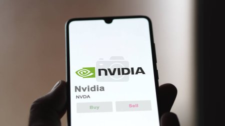 Photo for April 04th 2024. The logo of Nvidia on the screen of an exchange. Nvidia price stocks, $NVDA on a device. - Royalty Free Image