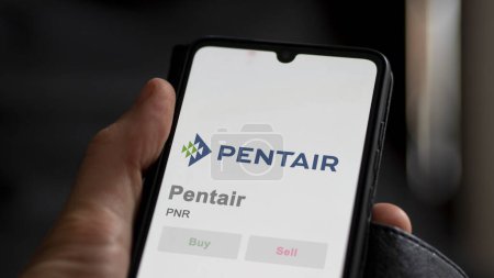 Photo for April 04th 2024. The logo of Pentair on the screen of an exchange. Pentair price stocks, $PNR on a device. - Royalty Free Image