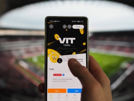 Photo for Fan of Vitaly looks at his team's token VIT on Socios app, the $VIT token of the French e-sport team nft on a screen. - Royalty Free Image