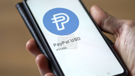 Photo for Close up on logo of (PYUSD) PayPal USD on the screen of an exchange. (PYUSD) PayPal USD price stocks, $PYUSD on a device. - Royalty Free Image