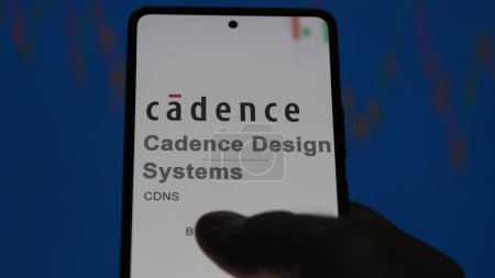 Photo for April 09th 2024 , San Jose, California. Close up on logo of Cadence Design Systems on the screen of an exchange. Cadence Design Systems price stocks, $CDNS on a device. - Royalty Free Image