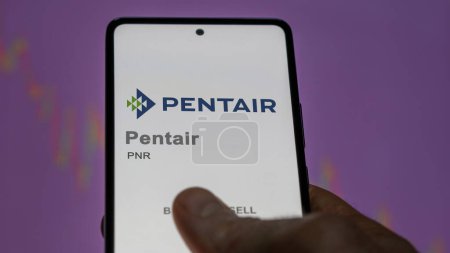 Photo for April 09th 2024 , Worsley, United Kingdom. Close up on logo of Pentair on the screen of an exchange. Pentair price stocks, $PNR on a device. - Royalty Free Image