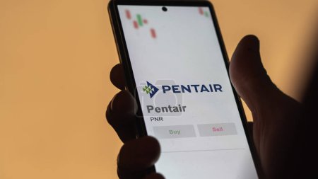Photo for April 09th 2024 , Worsley, United Kingdom. Close up on logo of Pentair on the screen of an exchange. Pentair price stocks, $PNR on a device. - Royalty Free Image