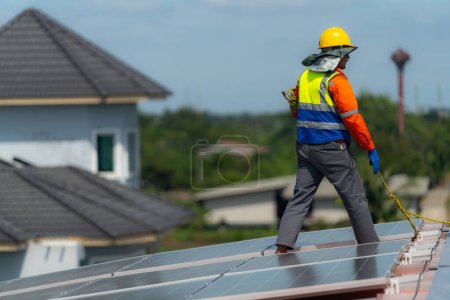 Photo for Worker Technicians are working to construct solar panels system on roof. Installing solar photovoltaic panel system. Alternative energy ecological concept. Renewable clean energy technology concept. - Royalty Free Image