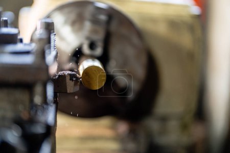 Photo for Close up of machine operation for Metal Lathes. The steel column rolling in machine. metalworking industry. finishing metal working internal steel surface on lathe grinder machine with flying sparks - Royalty Free Image