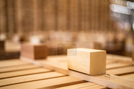 Foto de Caja de madera. fondo de madera de palet en almacén. sección de madera patrón. Rejilla de cuadrados de madera. la materia prima de la madera en la pila. - Imagen libre de derechos