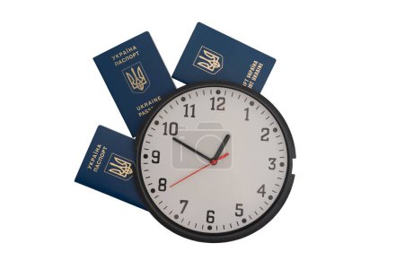 Three passports of Ukrainian citizens or migrants for visa-free travel to the European Union isolated on white background. Three foreign passports of Ukraine on a white background.