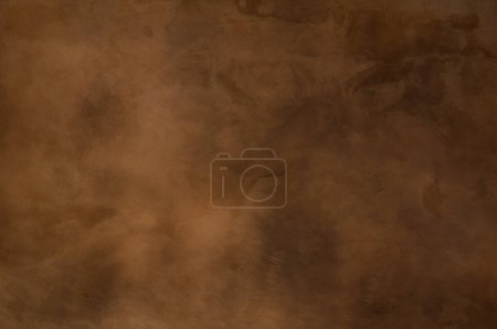 Foto de Textura de un hormigón marrón anaranjado como fondo, pared gruesa marrón - Grandes texturas para el fondo - Imagen libre de derechos