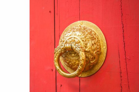 Photo for Door handle made from golden metal on the red door Old Chinese style - Royalty Free Image