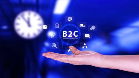 Photo for B2C, Business to customer marketing strategy concept. Businessman holding with virtual B2C icon for business strategy, communication, feedback, online marketing, Ecommerce marketing strategy. - Royalty Free Image