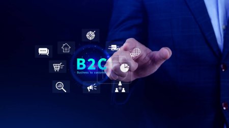 Photo for B2C, Business to customer marketing strategy concept. Businessman holding with virtual B2C icon for business strategy, communication, feedback, online marketing, Ecommerce marketing strategy. - Royalty Free Image