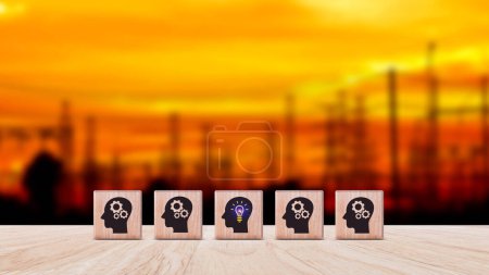 Photo for Thinking skills for business leader and manager concept. creative, systematic thinking skill, wooden cube block with head human symbol and light bulb icon creative idea concept. - Royalty Free Image