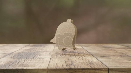 Téléchargez les photos : Une cloche en bois sur une table en bois - en image libre de droit