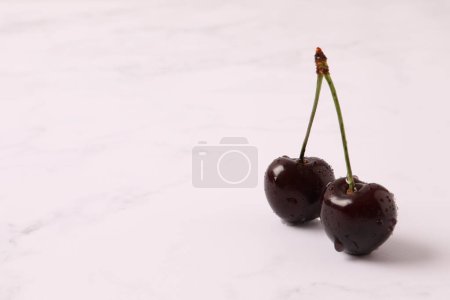 Photo for Sweet ripe cherries with drops on marble background, top view. sweet fruit - Royalty Free Image