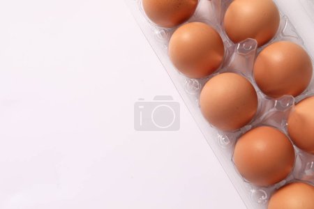 Téléchargez les photos : Œufs de poulet dans la boîte - en image libre de droit