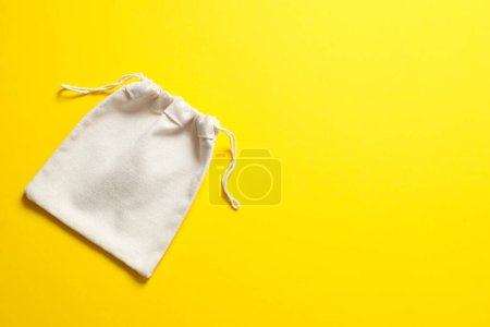 Small eco sack on color background. Top view.