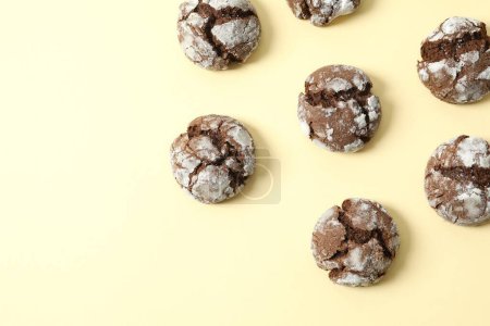 Delicious brownie cookies on color background