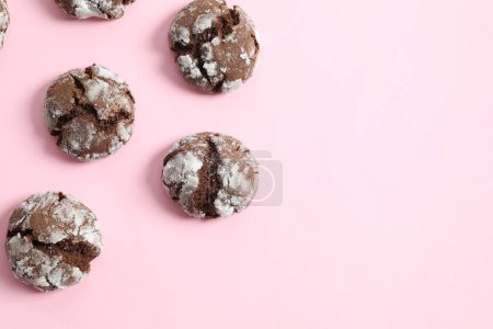 Delicious brownie cookies on a color background 