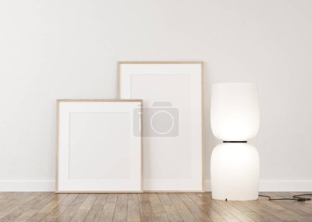 Foto de 3d Renderizado de marcos blancos en pared de yeso claro y suelo de madera. Marcos blancos en la pared. Lámpara - Imagen libre de derechos