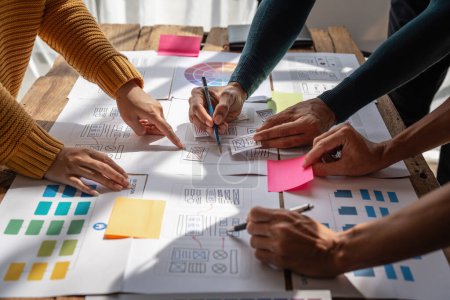 Photo for Group of ux developer and ui designer brainstorming about app interface design at modern office. Creative digital development agency. - Royalty Free Image
