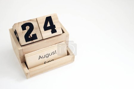 Photo for Wooden perpetual calendar showing the 24th of August - Royalty Free Image