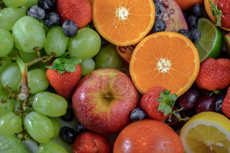 Vibrante primer plano de surtidos de frutas frescas mezcladas en exquisita resolución 4K